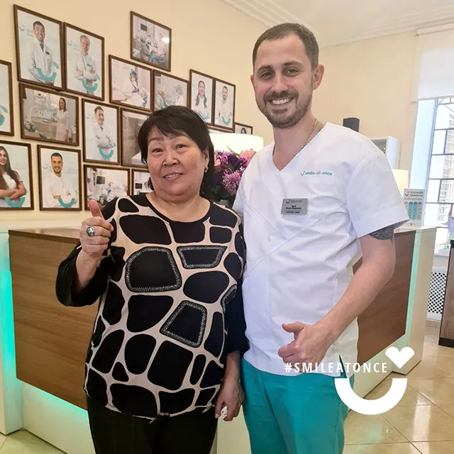 Фото после имплантации зубов