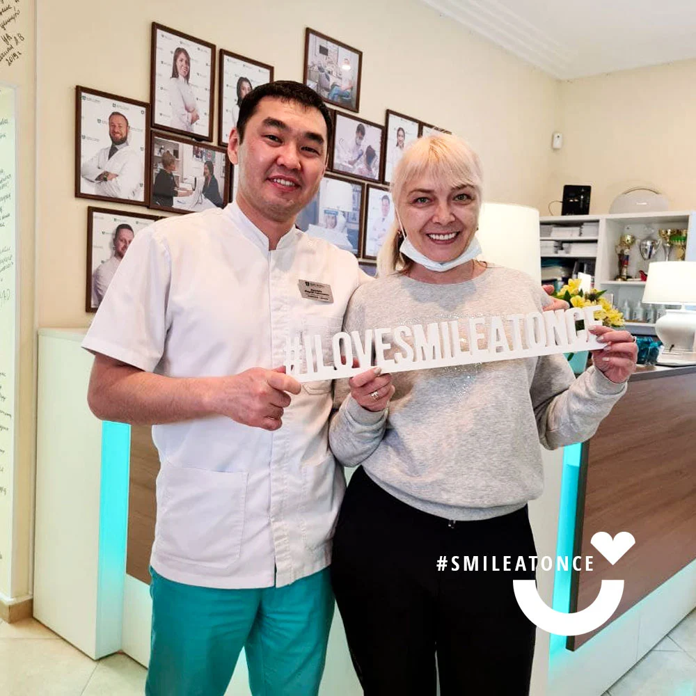 Фото через 8 лет после комплексной имплантации