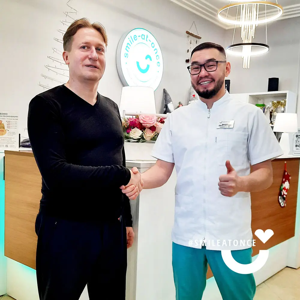 Фото через 2 года после имплантации зубов